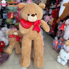 Gấu bông teddy xù  ôm trái tim đỏ một bên