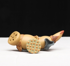 Gác nắp ấm củ sen - Pet trà kt: 14*6*4.2cm