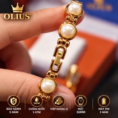 ĐỒNG HỒ NỮ OLIUS MẶT TRÒN 26MM – MẶT VÀNG – DÂY NGỌC TRAI TRẮNG – THÉP VÀNG HỒNG – MÁY QUARTZ