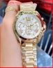 dong-ho-cap-doi-michael-kors-mat-trang-chronograph-day-vang-gold-timesstore-vn