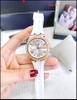 dong-ho-nu-guess-luxury-swarovski-rose-gold-silicone-trang-dep-gia-re-timesstore-vn