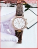 dong-ho-nu-michael-kors-chronograph-parker-day-da-nau-logo-timesstore-vn