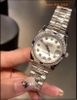 dong-ho-nu-rolex-mat-trang-4-hat-ruby-xanh-dep-gia-re-timesstore-vn