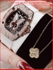 set-dong-ho-nu-hanboro-mat-oval-hinh-buom-dinh-da-swarovski-rose-gold-day-cao-su-trang-chinh-hang-dep-gia-re-timesstore-vn