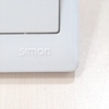 Bộ công tắc đơn vuông 1 chiều có phản quang màu Bạc Simon 50 51011BTYS