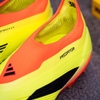 giay-bong-da-adidas-predator-2024-elite-laceless-vang-cam-khong-day-fg