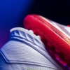giay-bong-da-adidas-f50-pro-tf-pure-victory-ie1220-trang-do-vang