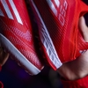 giay-bong-da-adidas-f50-elite-laceless-do-vach-trang-khong-day-tf