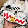 giay-bong-da-adidas-nemeziz-18-3-trang-mui-den-co-cheo-tf