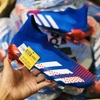 giay-bong-da-adidas-predator-20-tormentor-xanh-bien-vach-trang-mui-do-khong-day-