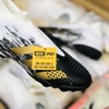 giay-bong-da-adidas-predator-20-trang-den-vach-vang-khong-day-co-cao-tf