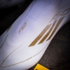 giay-bong-da-adidas-f50-elite-laceless-trang-vang-khong-day-fg