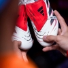 giay-bong-da-tre-em-adidas-predator-25-elite-tongue-trang-nga-vach-den-hq-fg