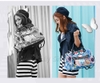 Túi xách tay teen, thời trang, cá tính JTXS 3 ngăn màu xanh jean đính đinh và nhiều logo dành cho bạn nữ (HongKong) - 220-710XD - (23x18x37cm)