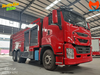 Xe chữa cháy Isuzu GIGA 12 khối màu đỏ nhìn góc ba phần tư phía trước trong nhà xưởng