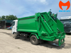 Thùng cuốn ép 8 khối trên xe Hino FC9JETC nhìn từ hông sau, thấy rõ thành thùng và cụm ép
