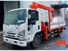 Xe tải Isuzu NPR cabin trắng gắn cẩu Taekang TKS-314V và giỏ nâng người