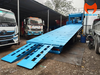 Sàn chở máy và cầu dẫn Chenglong H5 nhìn chéo từ phía sau