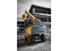 Xe nâng người Haulotte HT23 RTJ O triển khai cần tại công trình