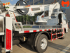 xe-o-to-nang-nguoi-27m-isuzu-lap-kinh-toa-nha-bao-tri-dien-gio