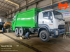 Xe cuốn ép rác Isuzu FVZ1500 cabin trắng và thùng xanh nhìn từ phía trước