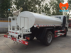 Bồn nước Isuzu nhìn từ góc sau, có sàn thao tác, lan can và súng phun