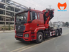 Xe đầu kéo cabin đỏ gắn cẩu gập SUNHUNK K728 phía sau cabin nhìn chéo phía trước
