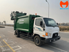 Xe ép rác Hyundai 110SP 9 khối nhìn chéo phía sau bên phải, thấy toàn bộ thùng chứa và cụm nạp rác