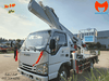 xe-o-to-nang-nguoi-27m-isuzu-lap-kinh-toa-nha-bao-tri-dien-gio