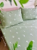 set-ga-goi-cotton-cuc-trang-nen-xanh-la-sggct230