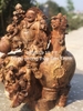 Tượng di lặc gỗ Nu Hương