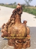 Tượng di lặc gỗ Nu Hương