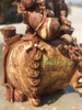 Tượng di lặc gỗ Nu Hương