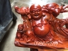 Tượng di lặc kéo bao tiền gỗ cẩm lai nguyên khối, Cao 33cm rộng 79cm sâu 23cm