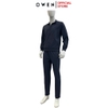 Bộ Thể Thao Nam Owen BTT256157 màu xanh tím than dáng reguler, áo cổ 3 phân, khóa kéo, tay và gấu bo chun, quần cạp chun ống suông chất liệu polyester
