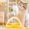 Đồ chơi cho mèo hình nơ kèm lò so lông vũ 20*28cm