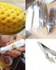 Dụng cụ gắp mắt dứa