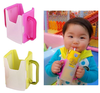 Giá đỡ cốc uống hộp sữa chống móp có quai cầm, có thể điều chỉnh theo kích thước hộp, gấp gọn cho bé
