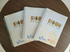 Sổ tay và Bút bi in logo Kid English