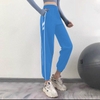 Quần tập jogger dù co giãn viền dạ quang