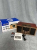Loa Bluetooth kiêm đồng hồ để bàn hãng NNS S106 - vỏ vân gỗ , có FM
