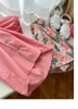 Set Tracie áo hồng nút cài quần hoa