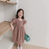 Đầm hoa hở lưng