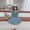 Đầm hoa hở lưng