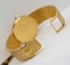 dong-ho-corum-twenty-dollar-18k-gold