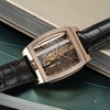 corum-golden-bridge-automatic-in-rose-gold-with-diamond-bezel-on-brown-crocodile