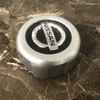 Logo chụp mâm, ốp lazang bánh xe ô tô Nissan NS-046, đường kính 130mm