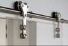 CỬA KÍNH LÙA TREO TRÊN THANH INOX