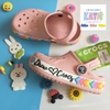 Dép cá sấu Crocs trẻ em DREW màu hồng nhạt