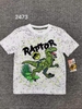 Áo thun bé trai khủng long Raptor màu trắng vảy sơn